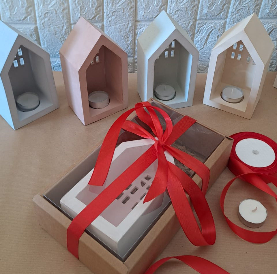 Concrete house with a candle