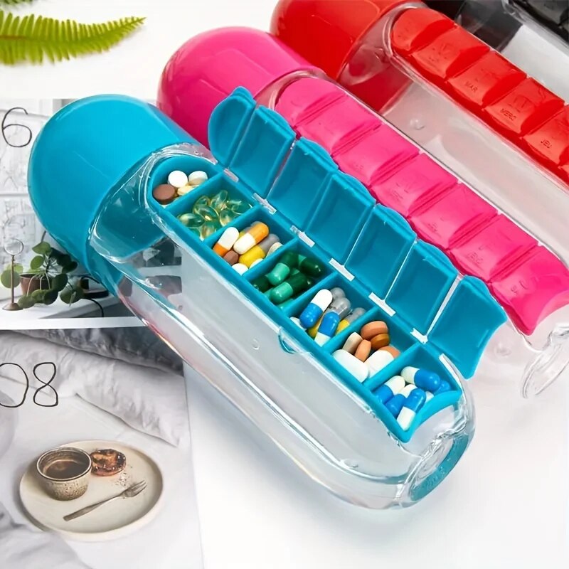 Water bottle with pills holder