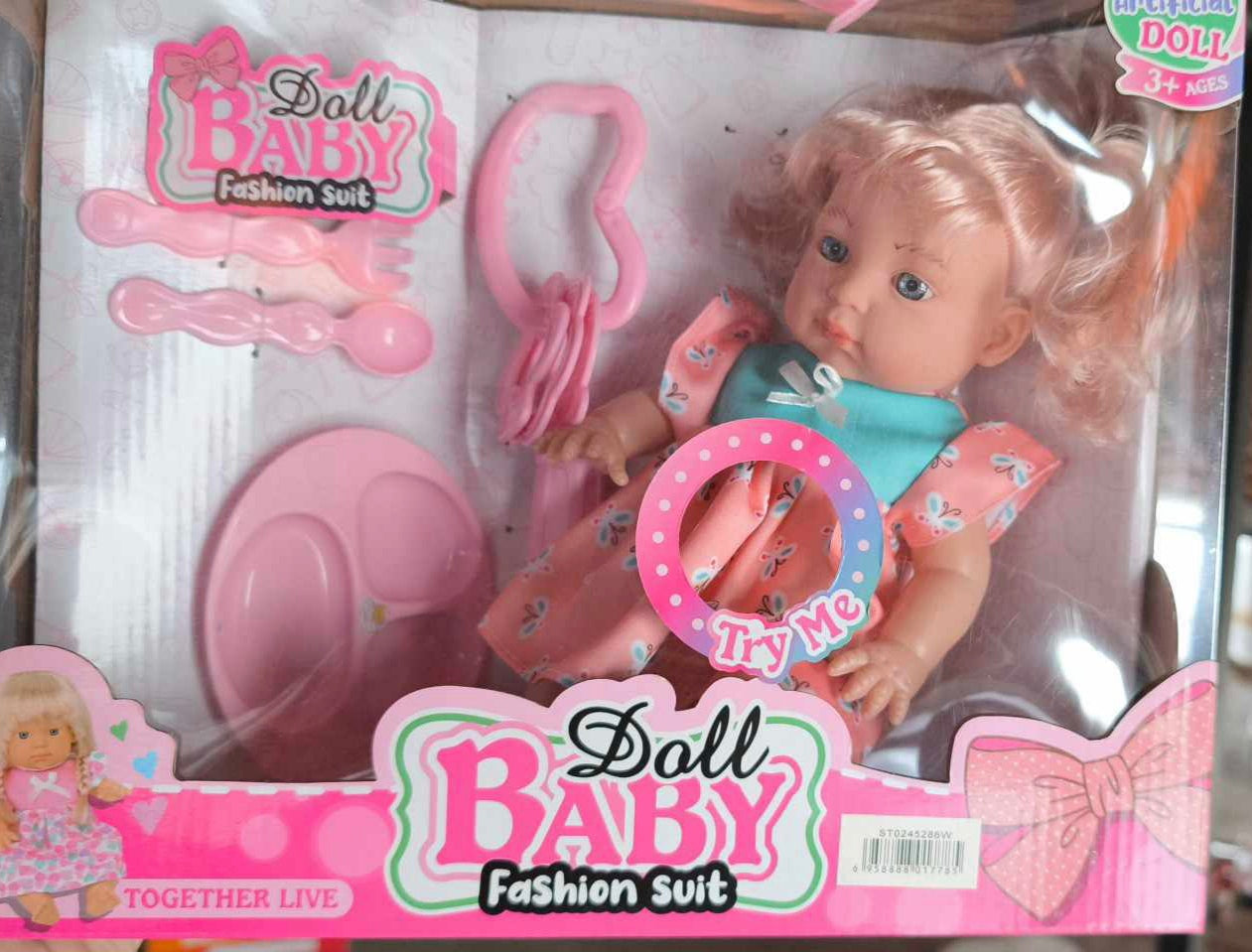 Doll set with plate, spoon and rattle