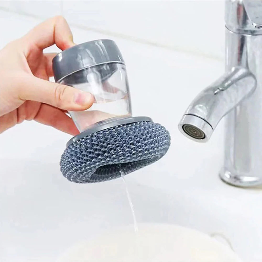 Soap dispensing brush