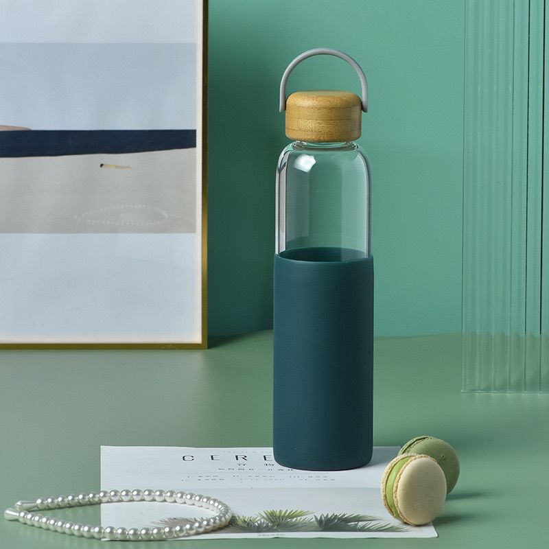 Glass bottle with silicone protection