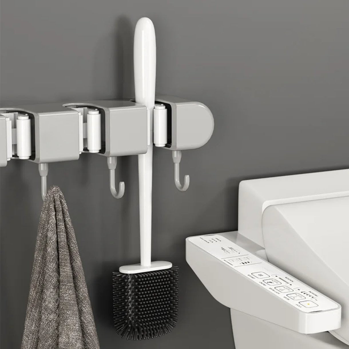 Broom wall mounted hanger