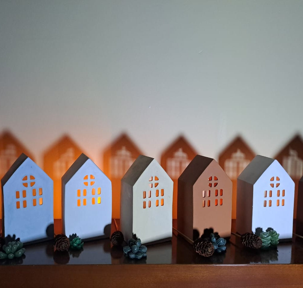 Concrete house with a candle